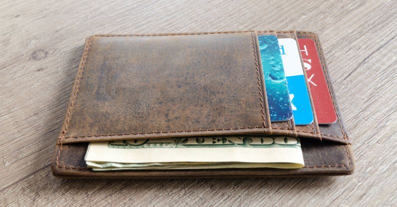 Wallets - Brown Leather Wallet and Us Dollar Banknote