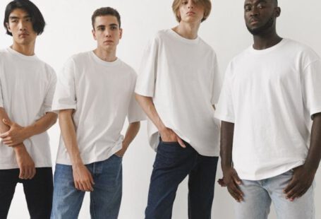 Denim Wash - Men Posing in White T Shirts and Jeans