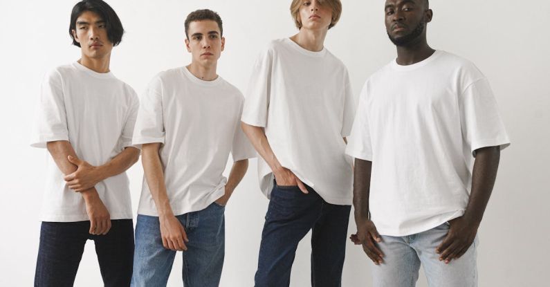 Denim Wash - Men Posing in White T Shirts and Jeans