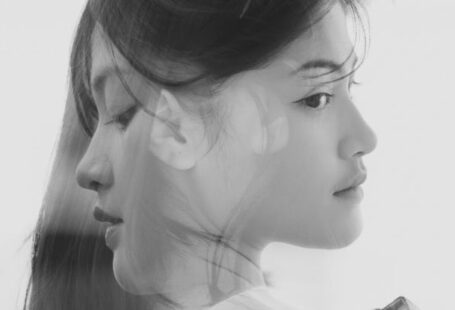 Layering - Black and White Double Exposure Portrait of a Young Beautiful Woman