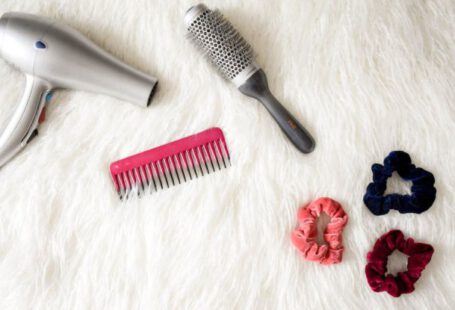 Hair Tools - Grey Hair Blower Near Pink Hair Combs and Scrunchies