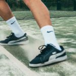 Athletic Shoes - Close-up Photo of Man Standing on Tennis Court